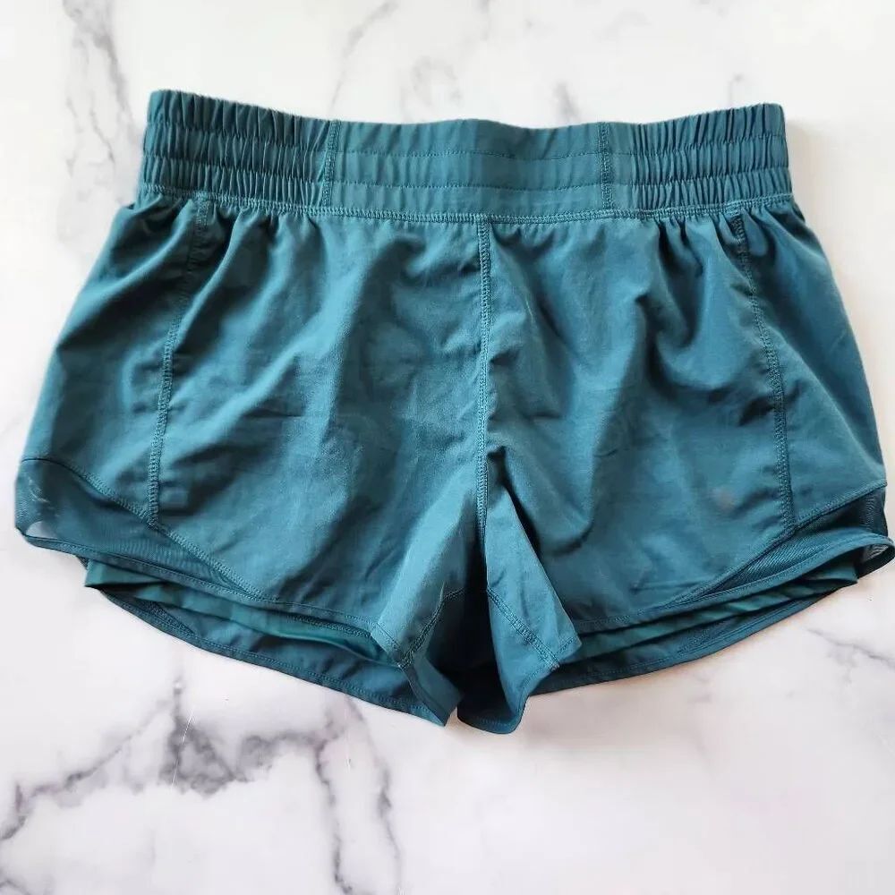 MPG women's medium dark pine Green short activewear short sporty pull on